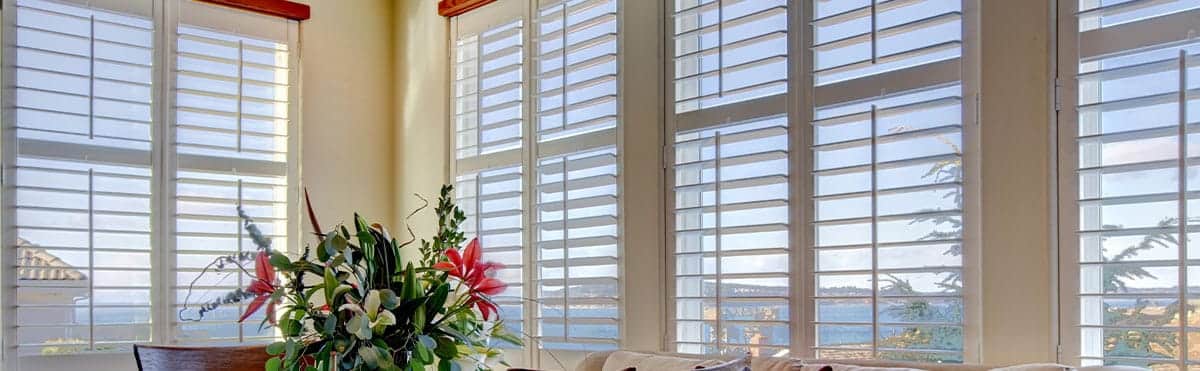 Window Blinds Overlooking Water