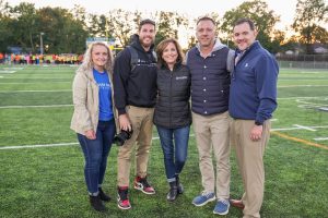 Representatives from West Shore Home at Trinity High School's football field in Camp Hill, PA.