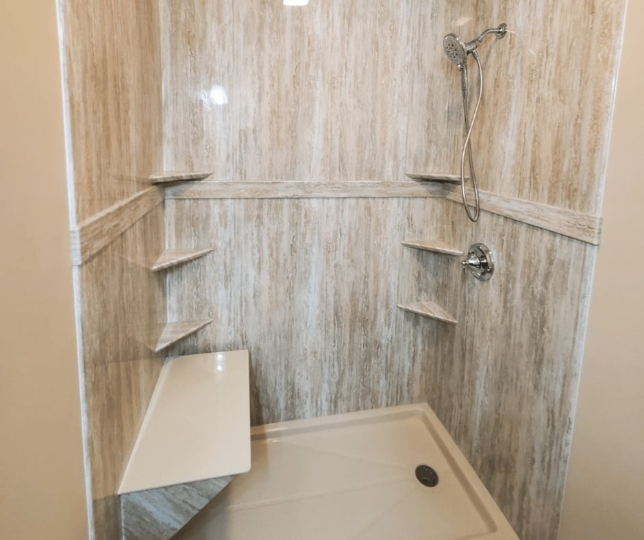 Large walk in shower with design.