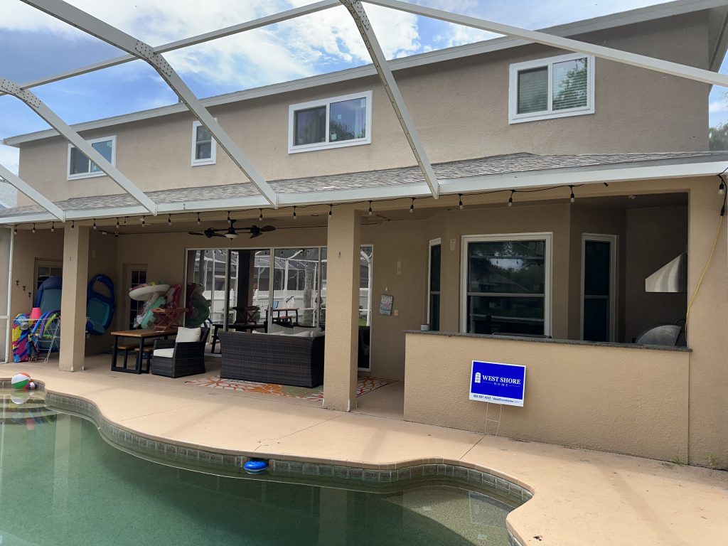 New white double pane windows under a Florida lanai.