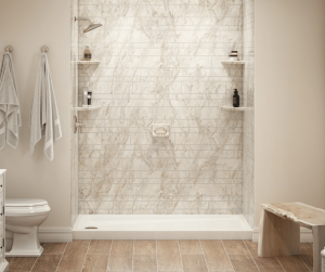 An acrylic walk in shower in coastal sands with laser etched tile, non slip shower pan, and shower shelves.